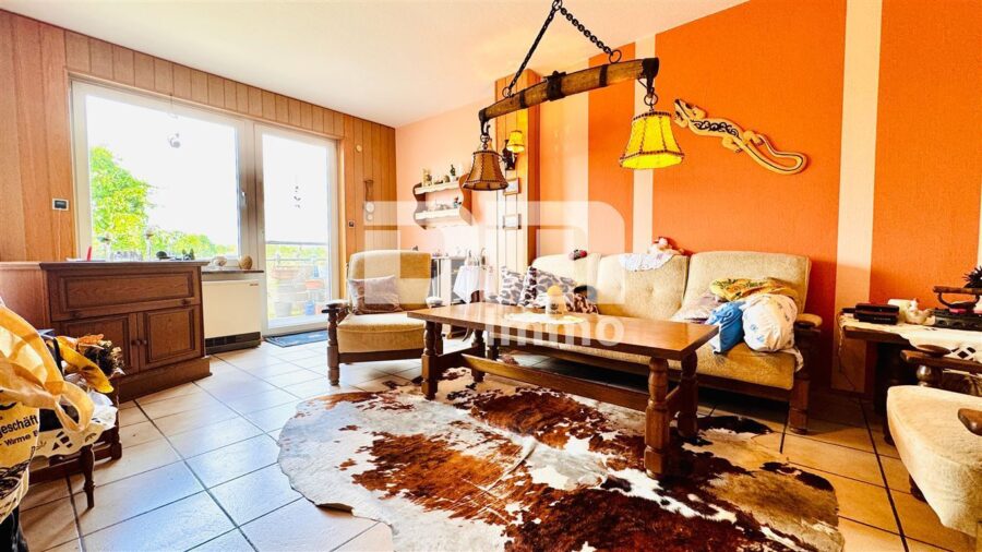 Ein- Zweifamilienhaus mit Innenhof, Balkon, Dachterrasse + Garage und zusätzliche Nutzflächen - WE1 Hochparterre Wohn / Esszimmer / Zugang Balkon
